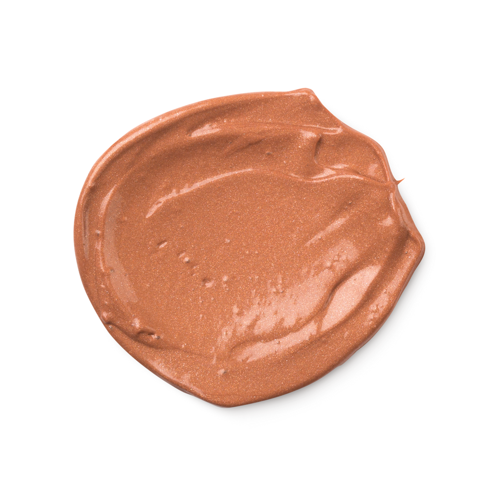 A swatch of slightly shimmery, rosy-bronze Charisma skin tint.