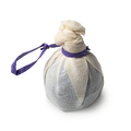 Deep Sleep. A round, purple bath bomb, beautifully wrapped in muslin tied in a knot and secured with a purple tie.