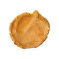 Sticky Dates. A round swatch of thick, golden, exfoliating body scrub with visible sugar granules and gold lustre throughout.