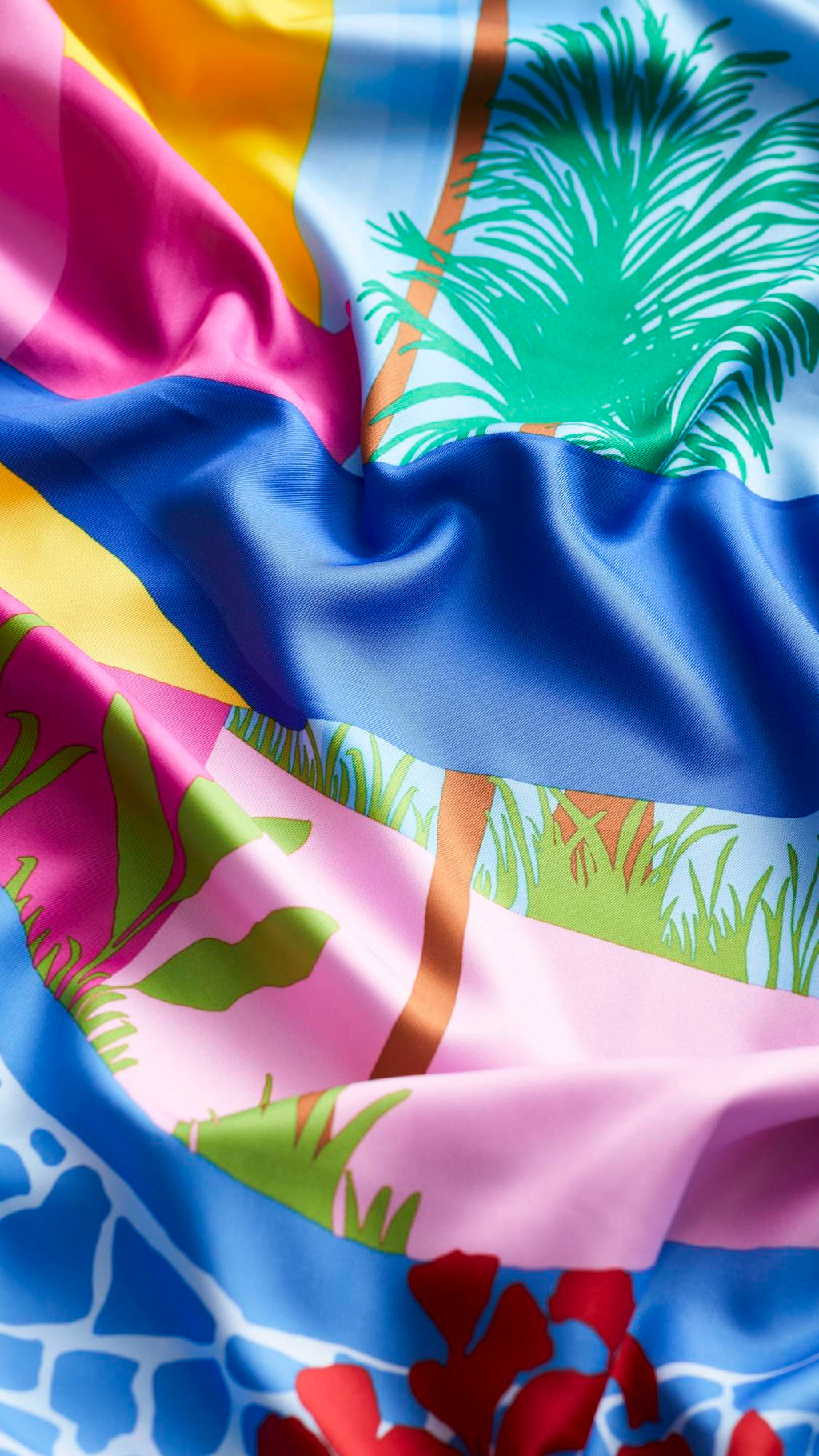 The image shows a close-up of the Summer Daydreams knot wrap focusing on the sheen of the fabric.