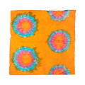 A square Lokta Wrap with orange, red and blue tie-dyed designs all over.