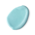 A swatch of thick, pale turquoise blue coloured Tingle body conditioner.